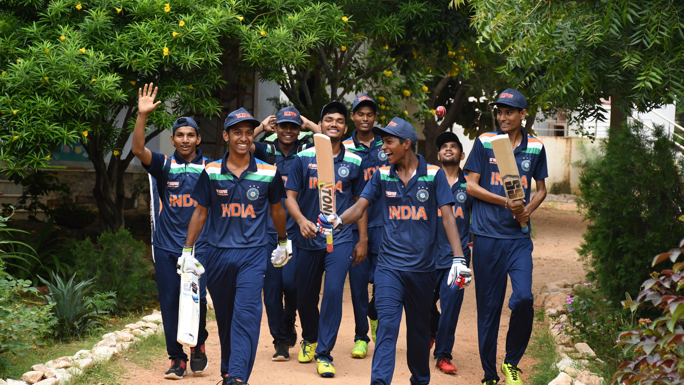 Boys from Bal Ashram in India team cricket kits — India
